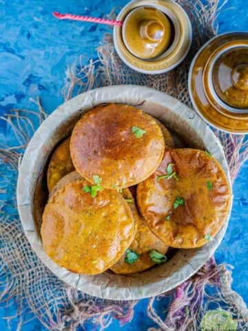 a bowl filled with Sweet Potato Masala Puri