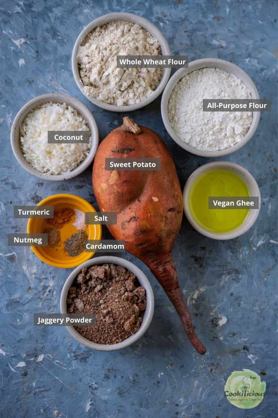 all the ingredients needed to make sweet potato puran poli placed on a table with labels on them