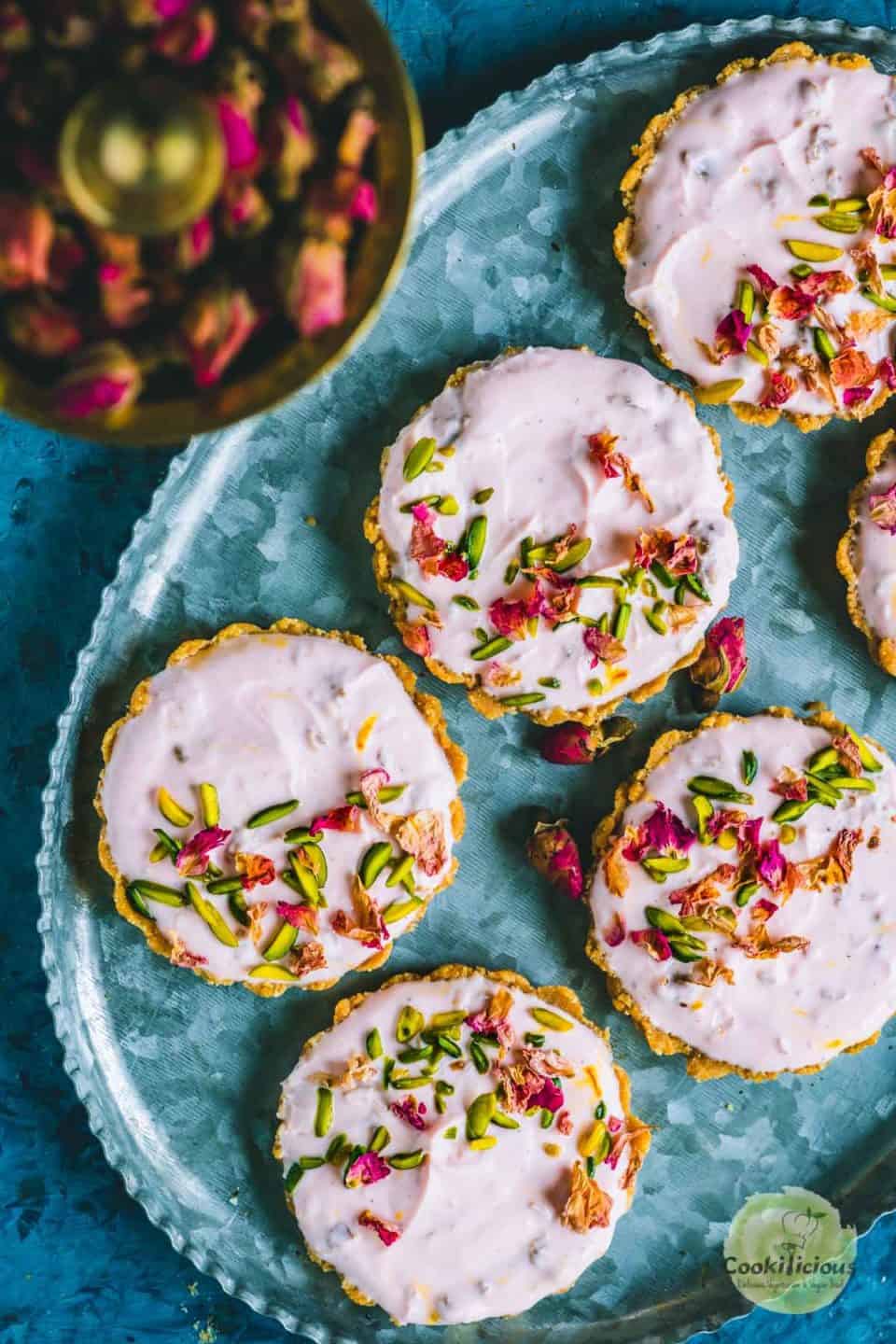 top view of Gulkand Shrikhand Sweet Tarts served in a tray