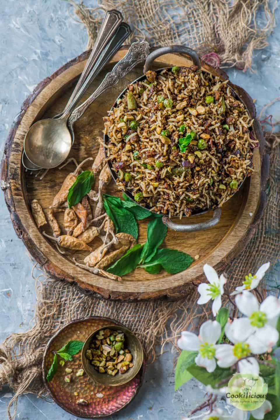 Pistachio Mint Rice served in a wooden tray