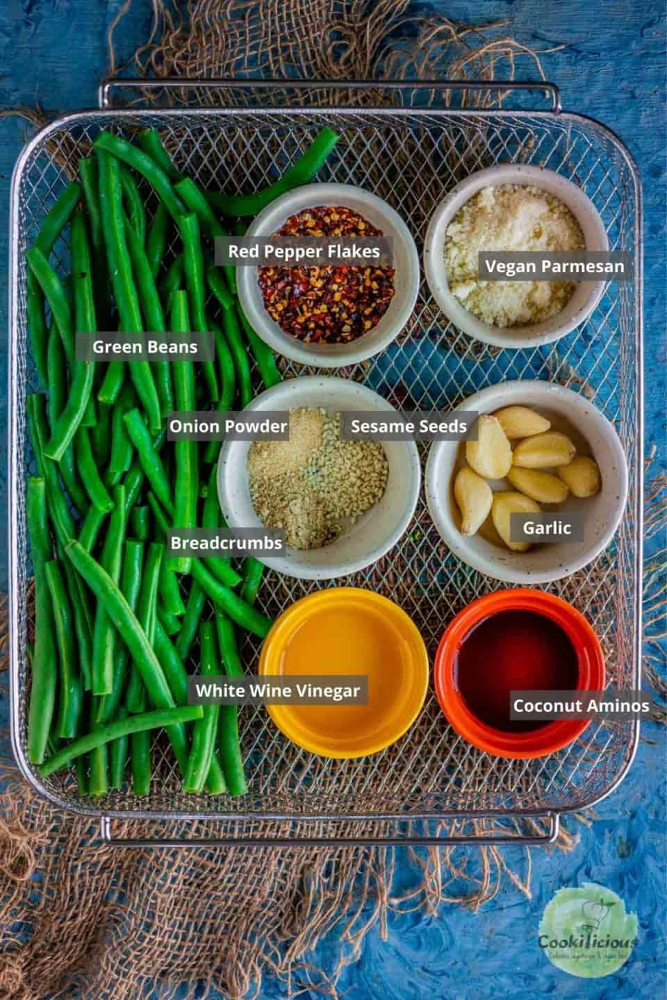 all the ingredients needed to make Air Fried Green Beans placed on a tray with labels on them