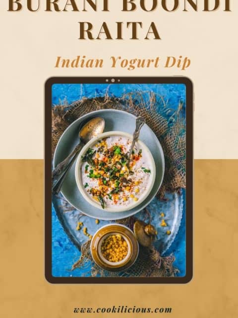 Burani Boondi Raita served in a bowl with a spoon in it and text at the top
