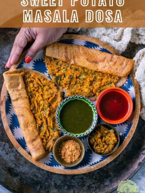 a hand holding a plate filled with 2 Masala Dosa with Sweet Potato and text at the top