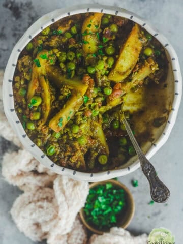 Nimona Matar served in a bowl with a spoon in it.