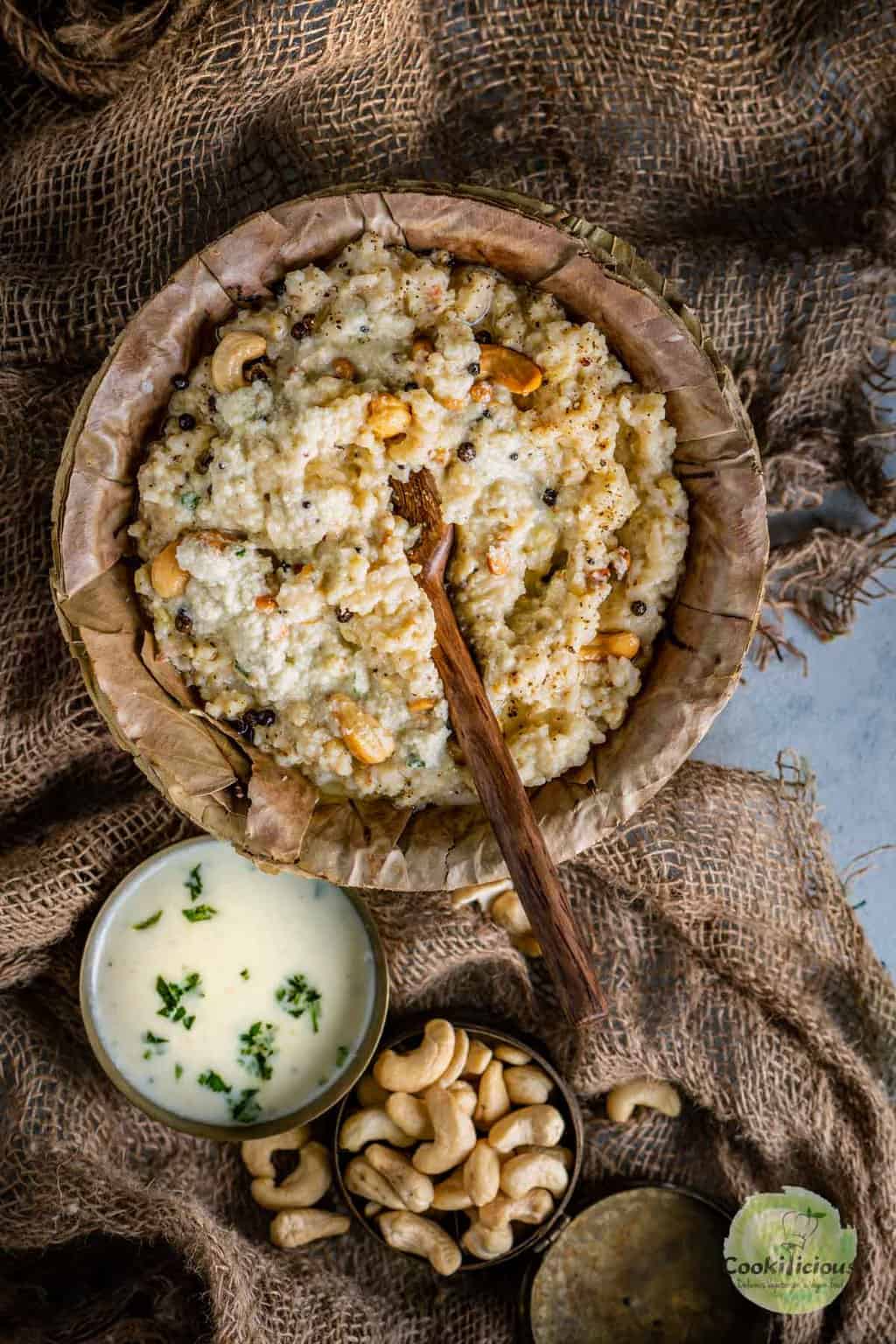 Hot Instant Pot Ven Pongal served with coconut chutney and sambar in a traditional South Indian style.
