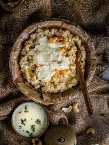 Instant Pot Ven Pongal served with coconut chutney on top