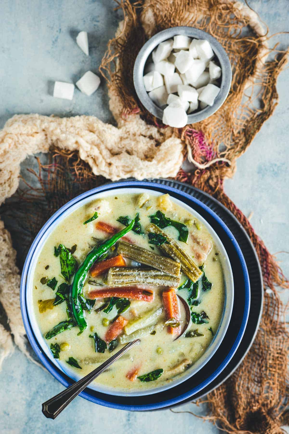 Tamil-style avial served hot in a bowl, ready to enjoy with adai or rice.