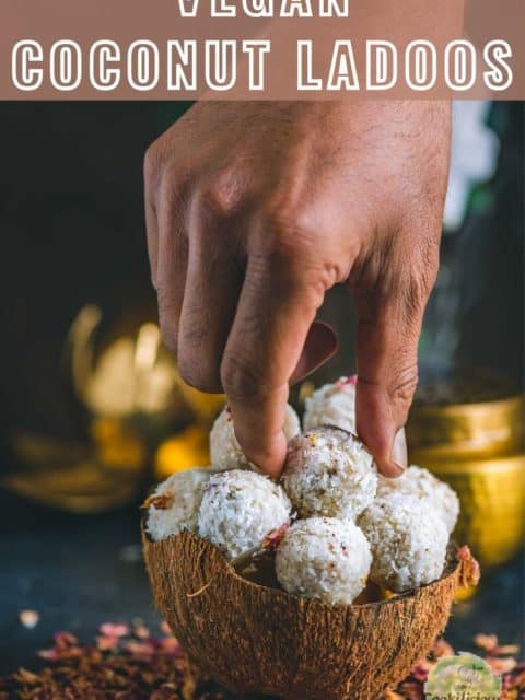 a hand picking up one coconut ladoo from a bowl and text at the top