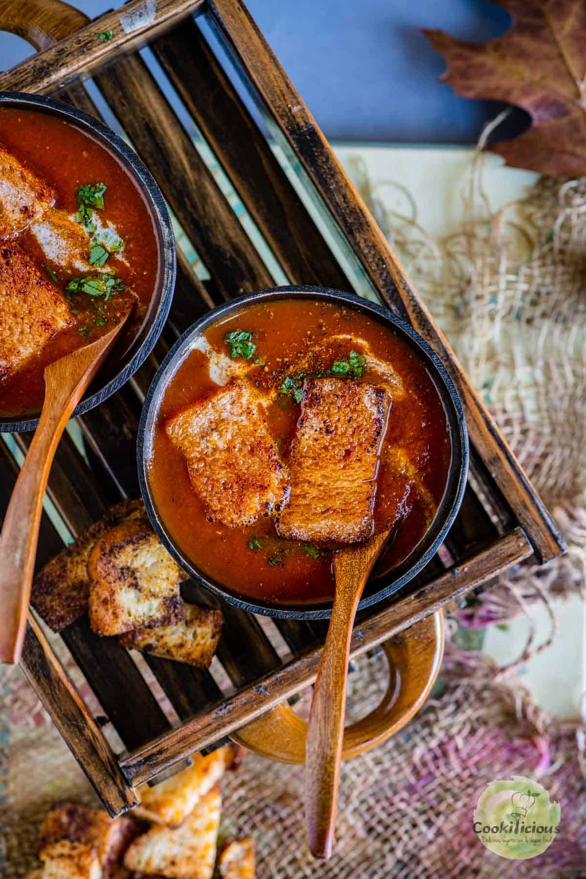 tomato soup served with croutons on top