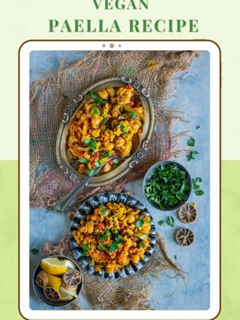 2 plates filled with Vegan Paella and text at the top and bottom