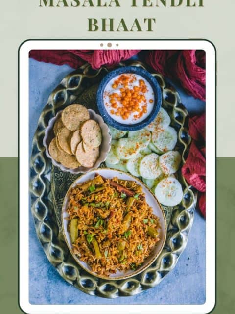 Tendli Masala Bhaat served in a platter along with salad, raita and papad and text at the top and bottom