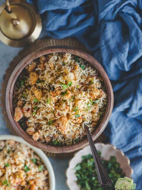 Paruppu Sevai served in a round bowl with a spoon in it