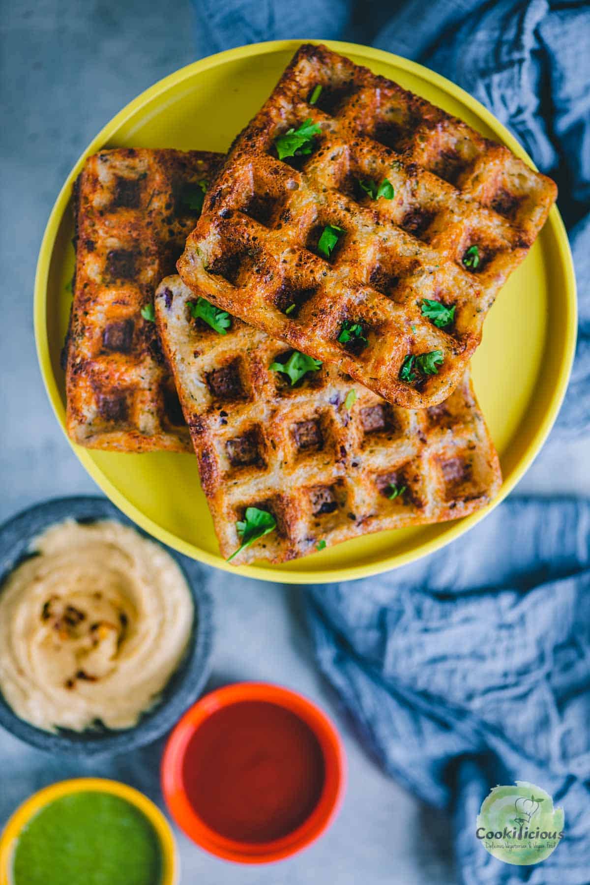 Potato Hummus Waffles served in a plate