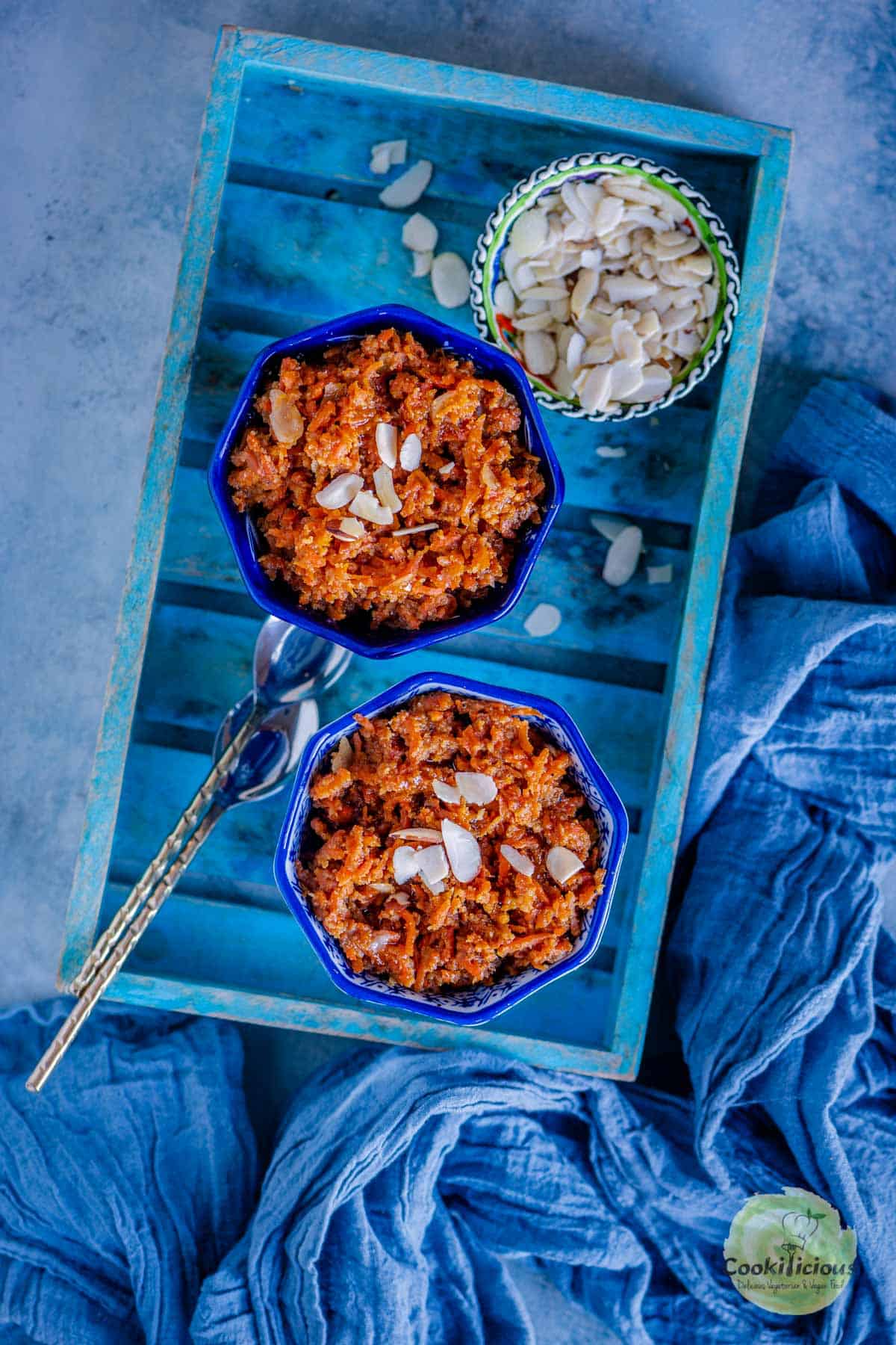 2 bowls of gajar halwa served in a tray
