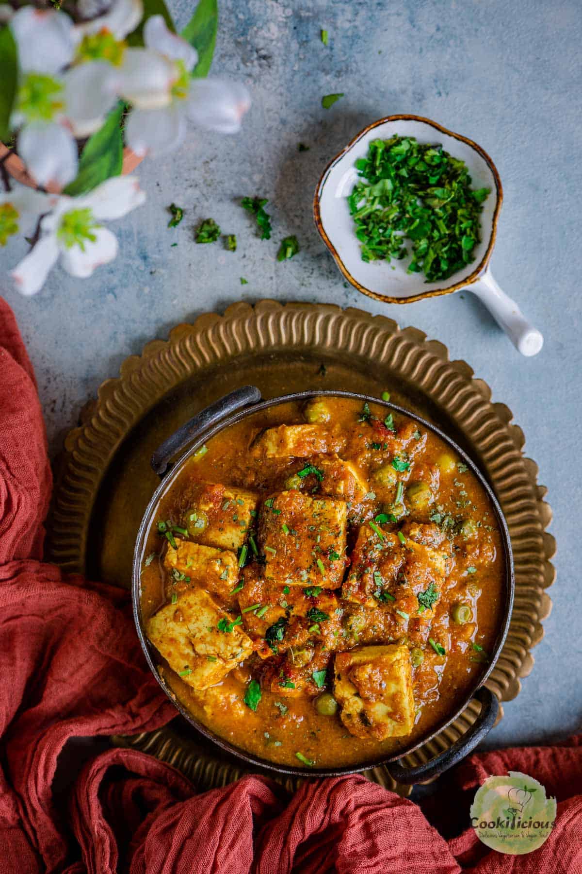 a bowl filled with Mutter Paneer