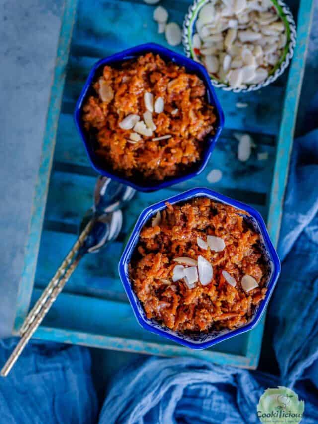 2 bowls of carrot halwa served in a a blue tray