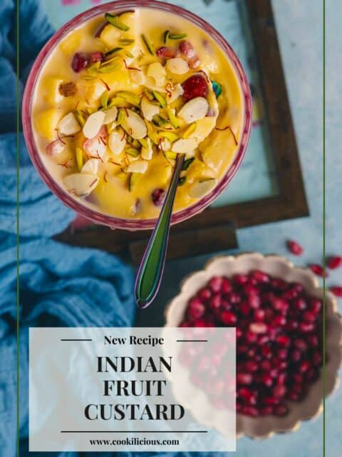 one bowl of Indian Fruit Custard with a spoon in it and text at the bottom left
