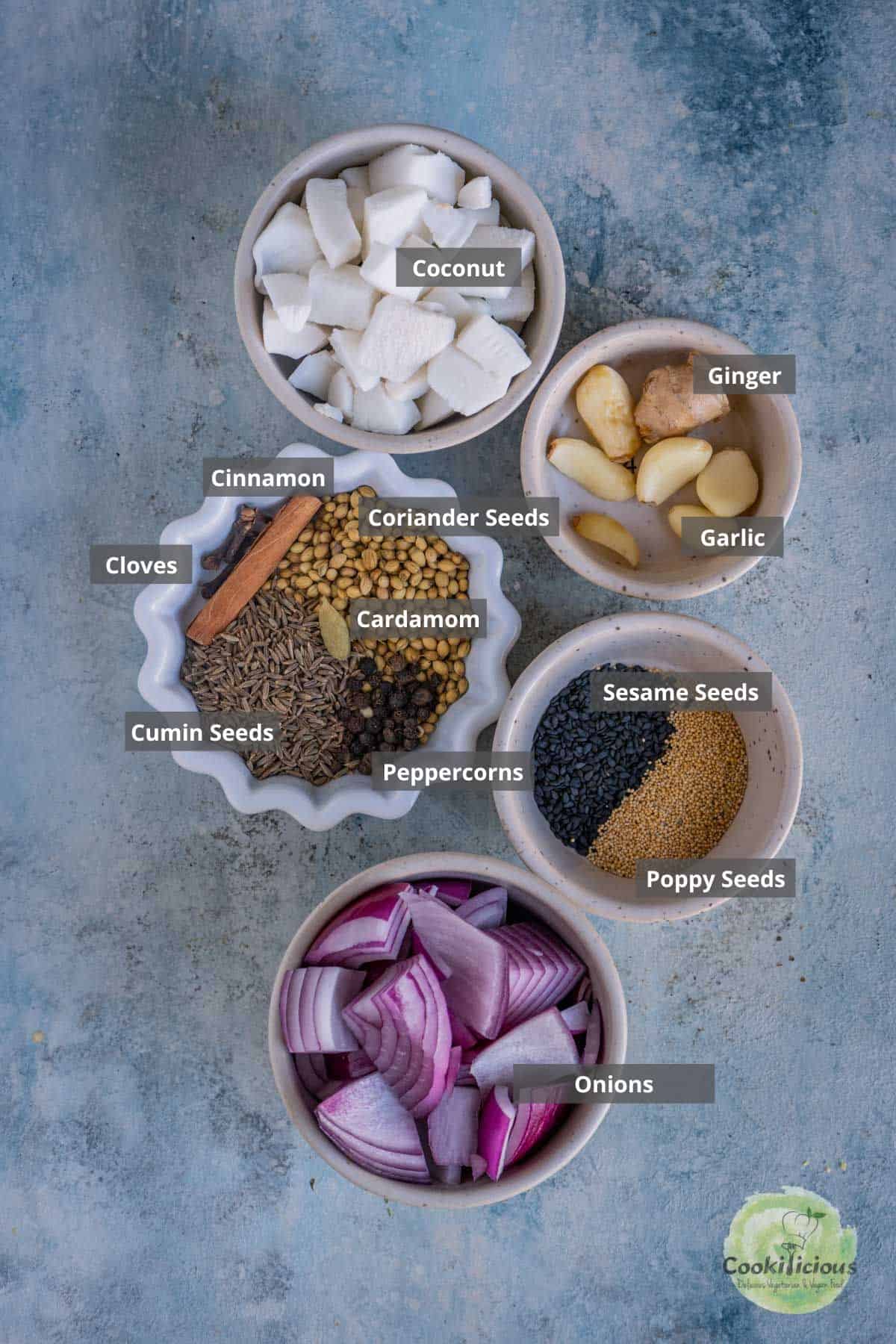 all the ingredients needed to make the vatan for misal placed on a table with labels on them