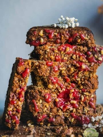 slices of Vegan Gluten-free Banana Strawberry Bread laid one on top of the other