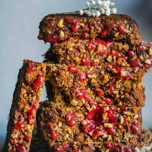 slices of Vegan Gluten-free Banana Strawberry Bread laid one on top of the other
