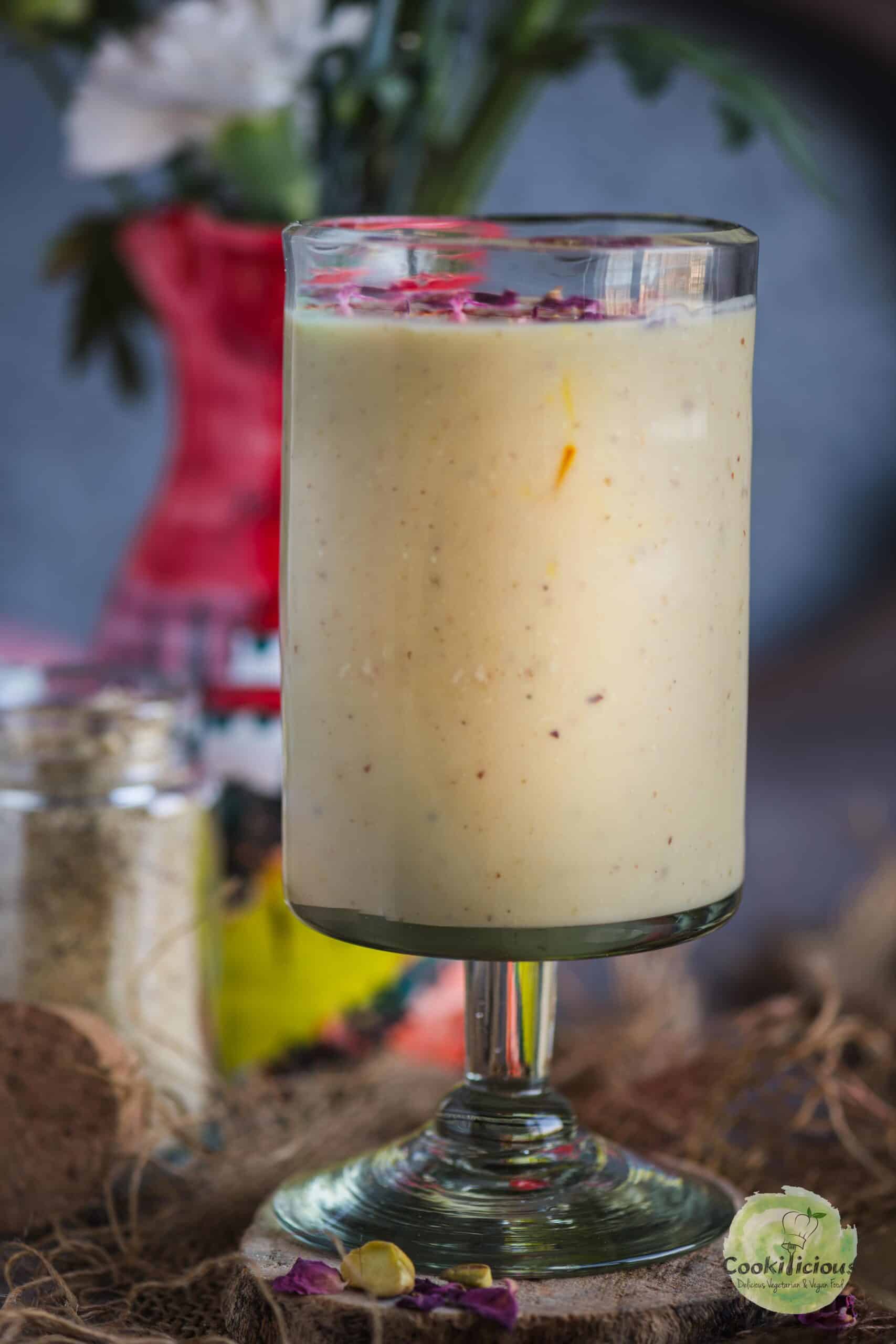 Instant Thandai served in a glass.