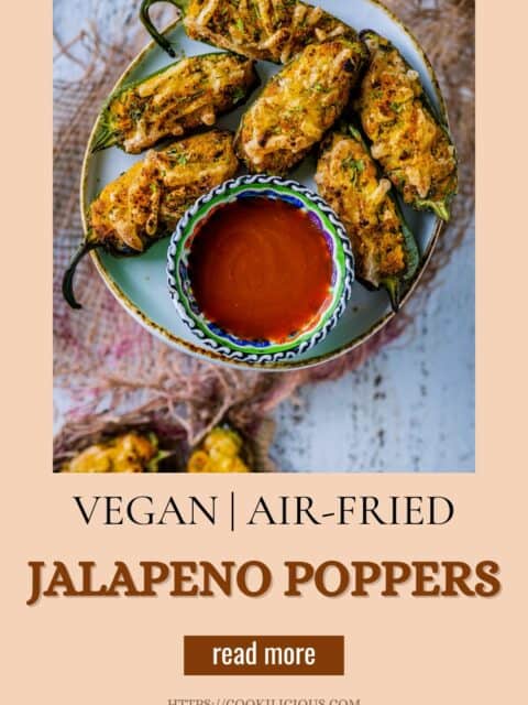 Vegan Air Fried Jalapeno Poppers served in a plate with a bowl of ketchup on the side and text at the bottom.