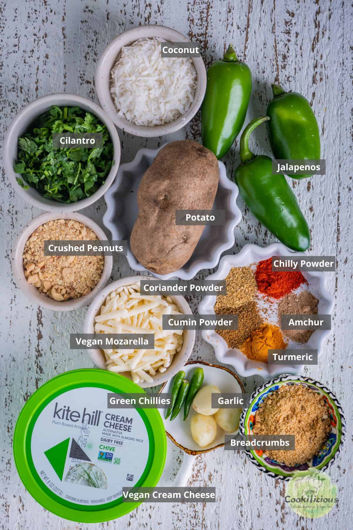 All the ingredients needed to make Vegan Air Fried Jalapeno Poppers placed on a table with labels on them.