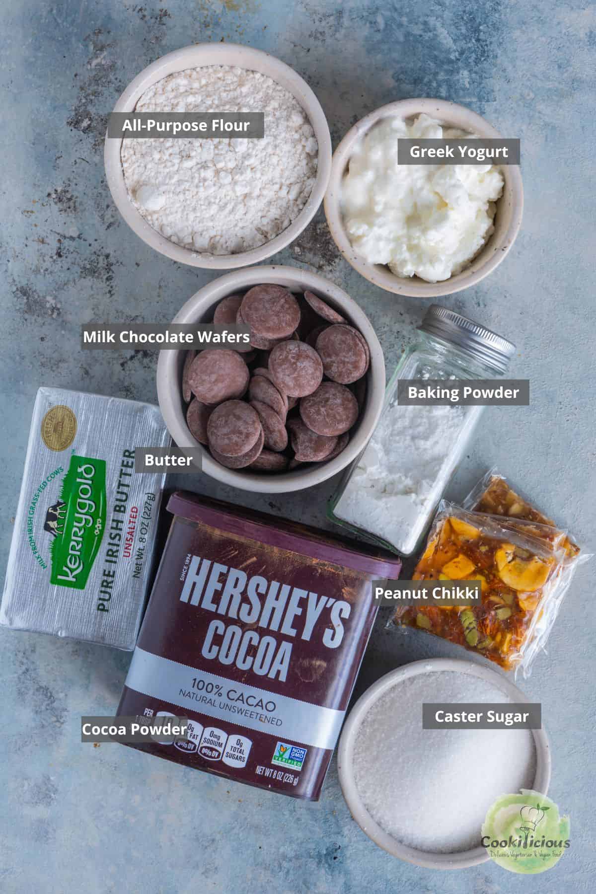 all ingredients needed to make Delicious Eggless Brownies placed on a table with labels on them.