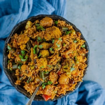 Tawa pulao served in a bowl with a spoon in it.