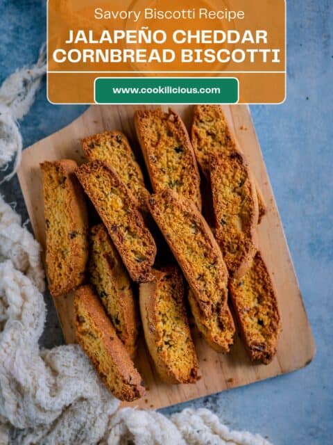 Jalapeño cheddar cornbread biscotti arranged on a wooden cutting board, with text reading “Savory Biscotti Recipe – Jalapeño Cheddar Cornbread Biscotti.