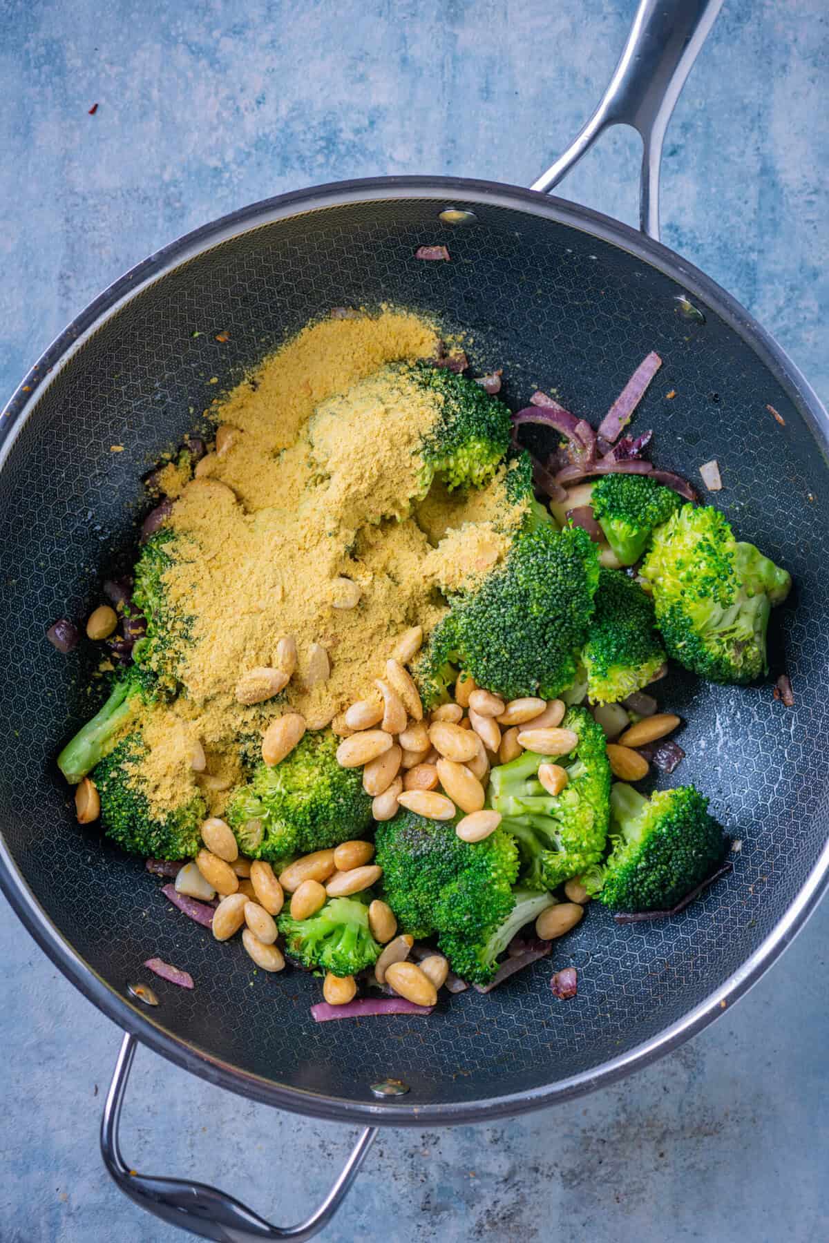 Blanched almonds and nutritional yeast added to broccoli cheddar soup.