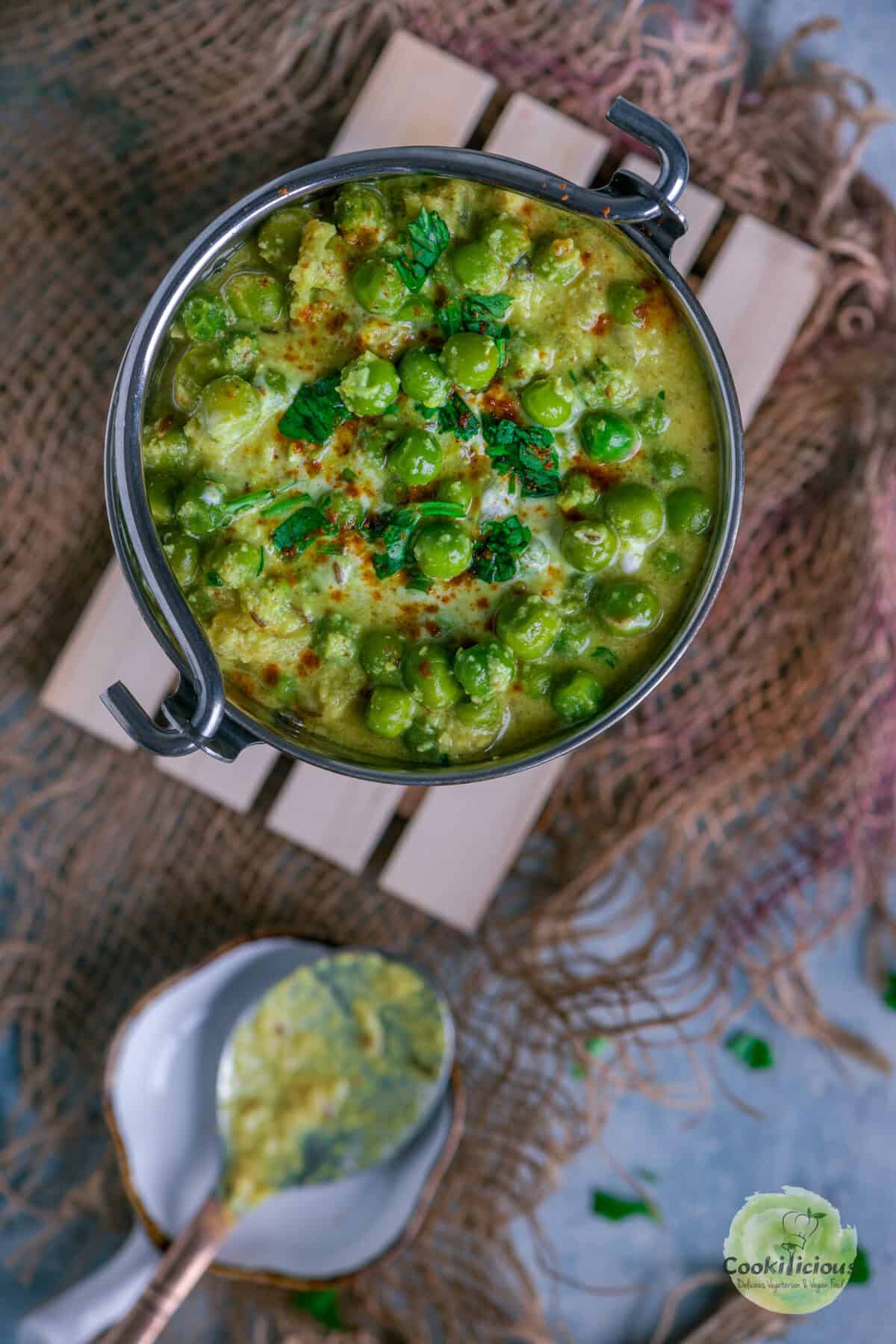 A bowl filled with vegan Green Peas Curry.