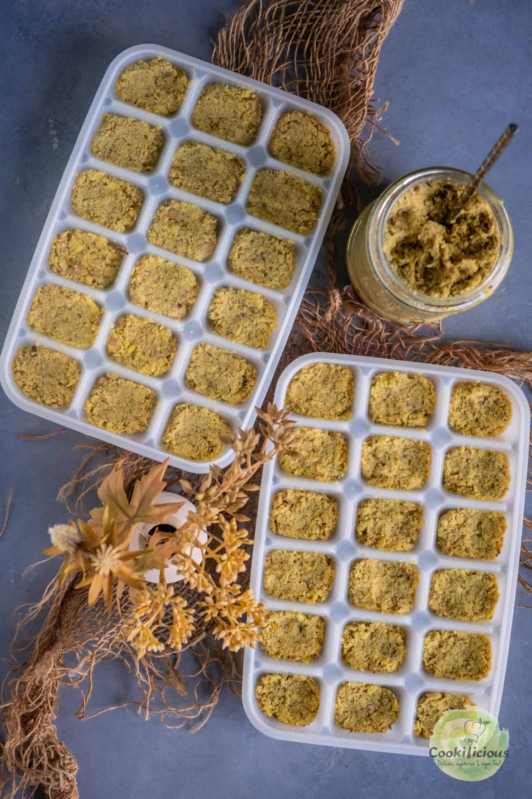 homemade ginger paste stored in ice cube trays for longer preservation.