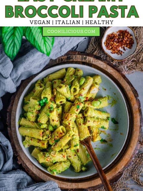 Creamy broccoli pasta served in a round plate with a fork in it and text at the top.