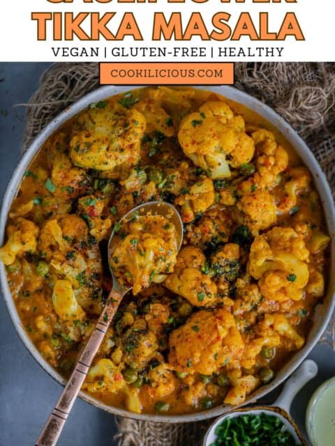 Easy Cauliflower Tikka Masala served in a bowl with a spoon in it and text at the top.