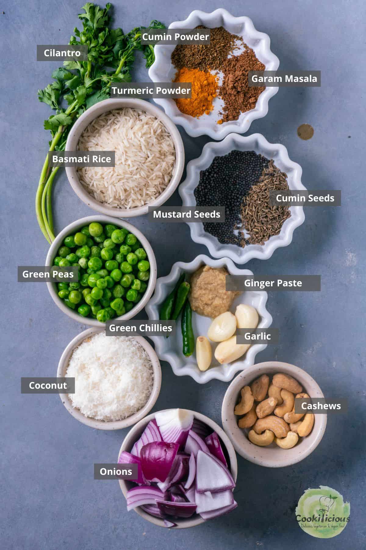 all the ingredients needed to make matar pulao placed on a table with labels on them.