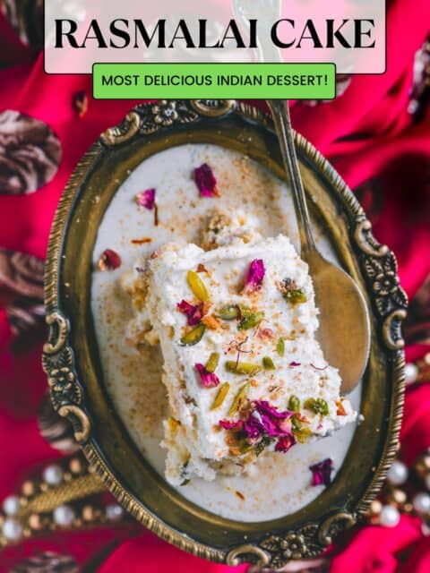 a slice of Indian rasmalai cake served in an oval dish with a spoon in it and text at the top and bottom.