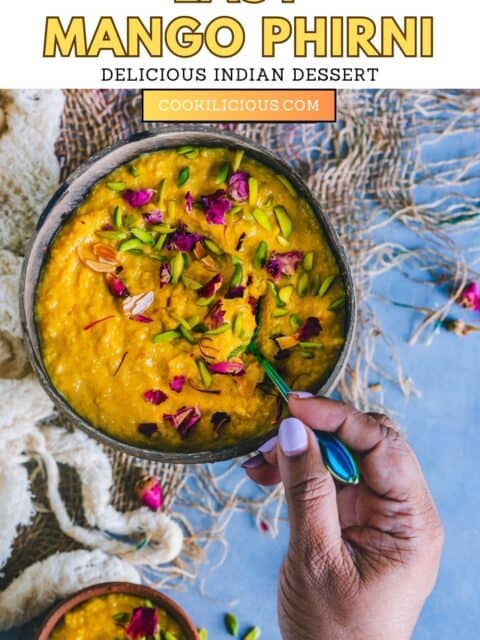 A hand digging into a bowl of Mango Phirni with a spoon and text at the top.