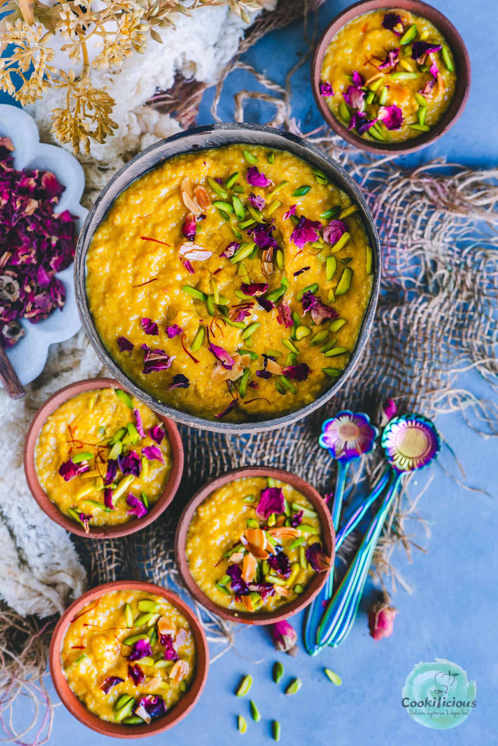 mango flavored phirni served in bowls.