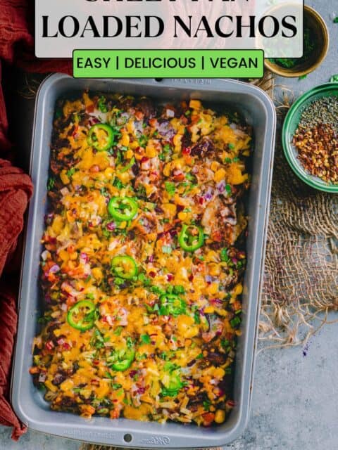 Veg Loaded Nachos served in a tray and text at the top and bottom.