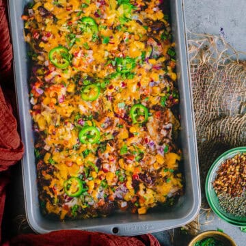 Veg Loaded Nachos served in a tray.