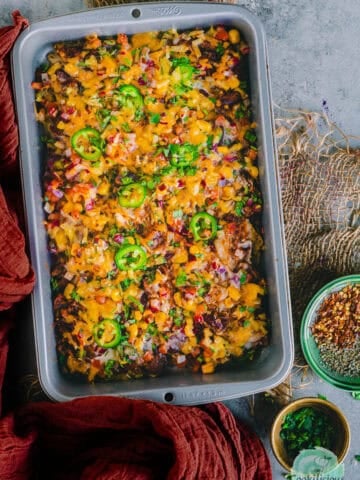 Veg Loaded Nachos served in a tray.