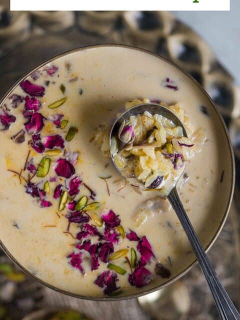 Instant Pot Rice Kheer served in a bowl with a spoon in it and text at the top.