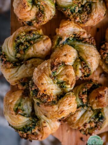 Vegetarian Spinach Paneer Puffs served in a tray.