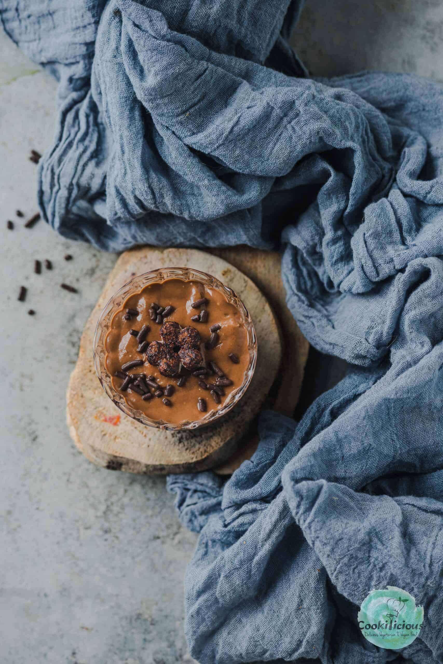 no-bake vegan chocolate mousse served in a small glass jar.