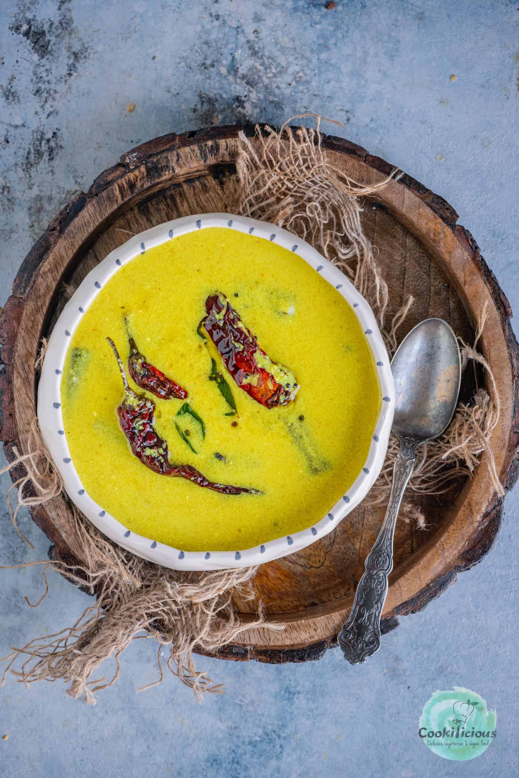 Delicious South Indian Mor Curry served in a bowl with tadka on top.