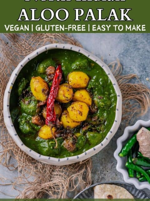 A bowl of Aloo Palak curry with golden potatoes in a creamy spinach gravy, served with chapati on the side and text at the top and bottom.