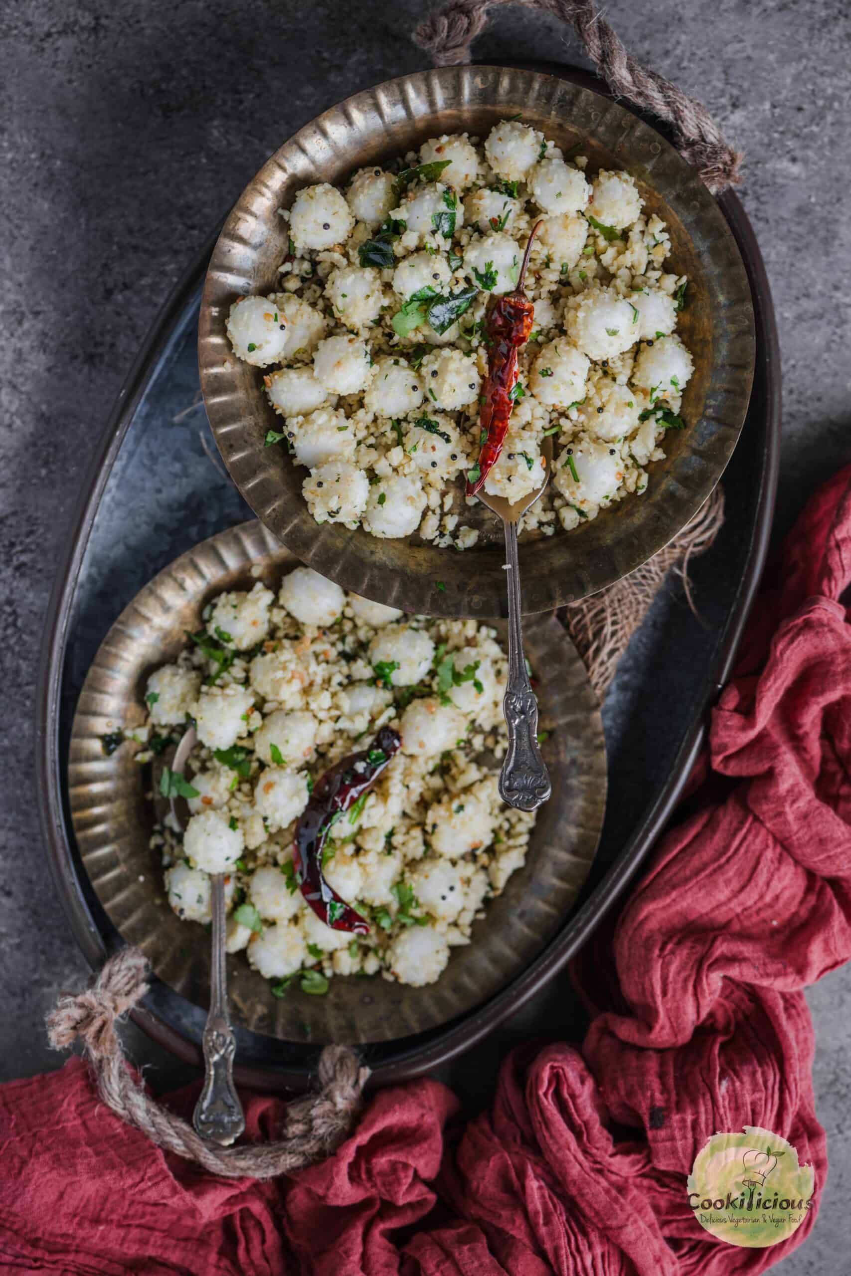 2 plates with spoons in it, filled with Ammini Kozhukattai.