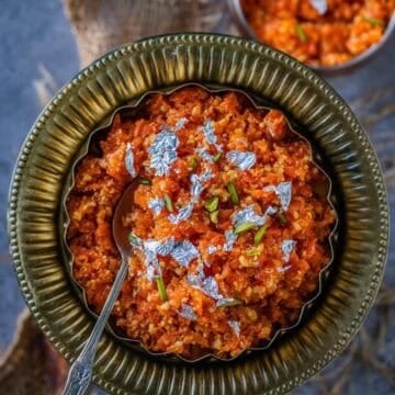 Microwave Gajar ka Halwa served in a decorative Indian bowl.