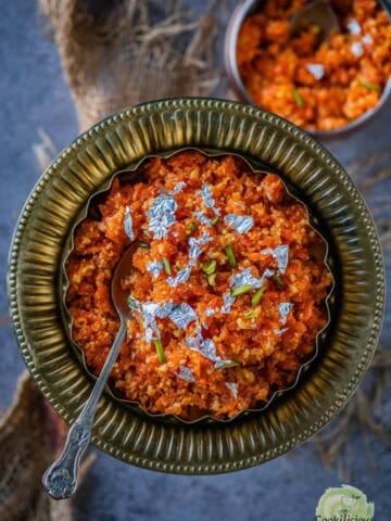 Microwave Gajar ka Halwa served in a decorative Indian bowl.